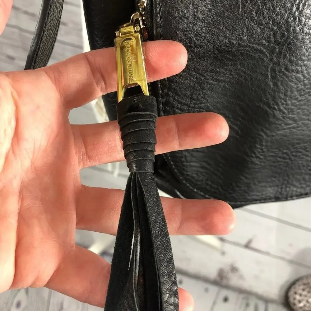 Juicy Couture shoulder crossbody bag in black with Gold embellishments.